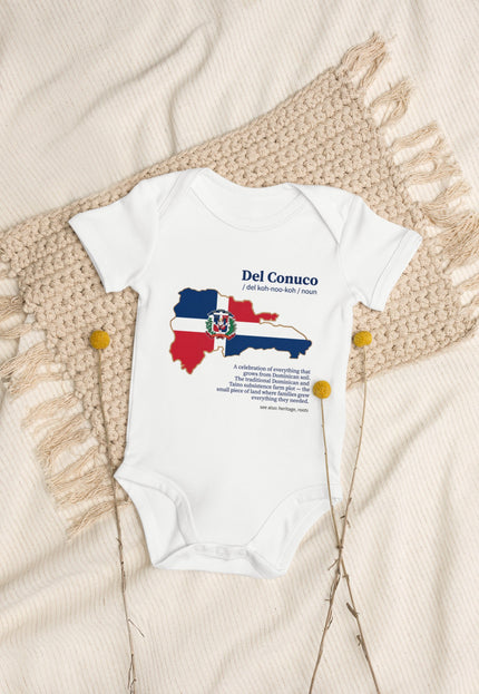 White Del Conuco baby bodysuit with Dominican flag map and blue definition lettering