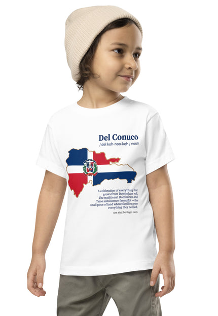 Toddler wearing white Del Conuco tee with Dominican flag map and blue definition lettering