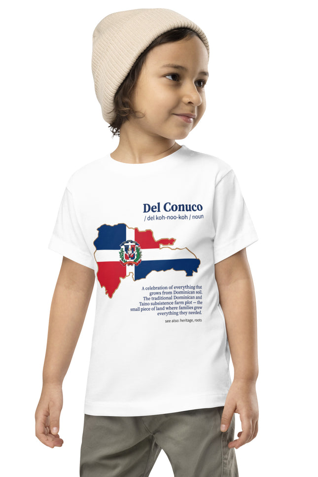 Toddler wearing white Del Conuco tee with Dominican flag map and blue definition lettering