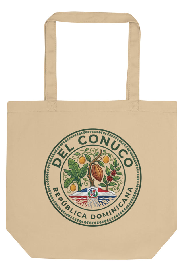 Natural organic cotton eco tote bag with Del Conuco Heritage Edition brand seal featuring cacao pod, banana leaves, coffee cherries, chinola vines, and Dominican flag at the base